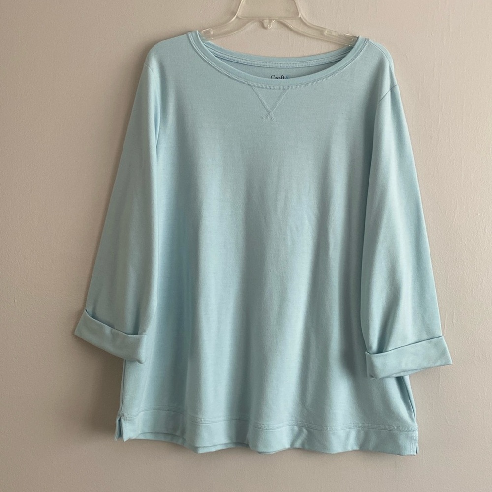 Light blue sweatshirt with rolled-up 3/4 sleeves, nice material, size XL